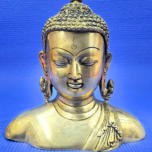 Brass face buddha