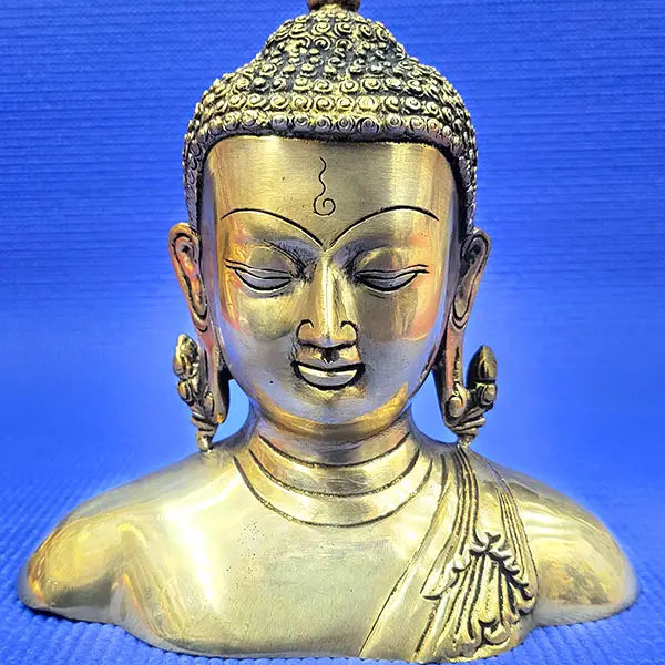 Brass face buddha